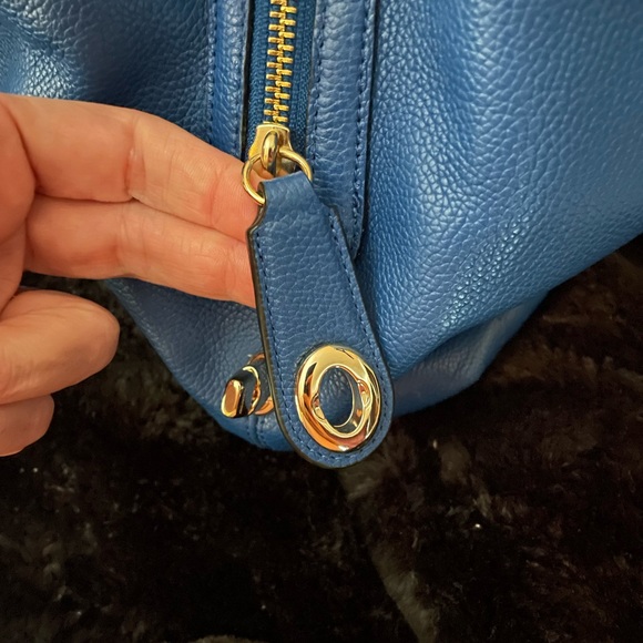 The Coach Edie bag soft slouchy silhouette style with functional design. - Picture 7 of 13